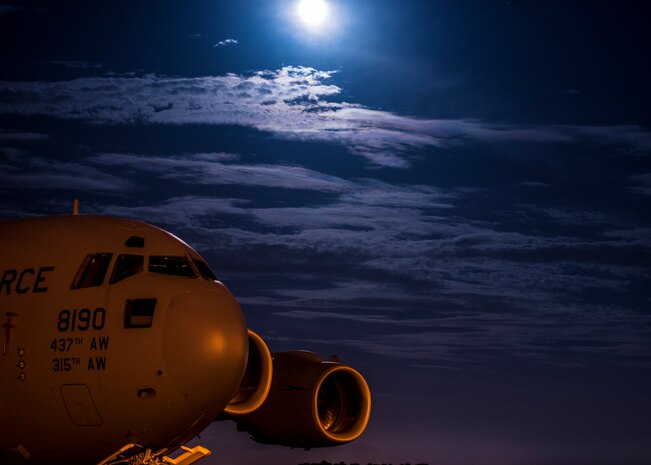 A full moon rises over a C-17 Globemaster III June 22, 2013, at Joint Base Charleston –Air Base, S.C. The full moon that occurred June 22 was considered a supermoon 10 percent visibly larger than any other full moon during the year. (U.S. Air Force photo/ Senior Airman Dennis Sloan)