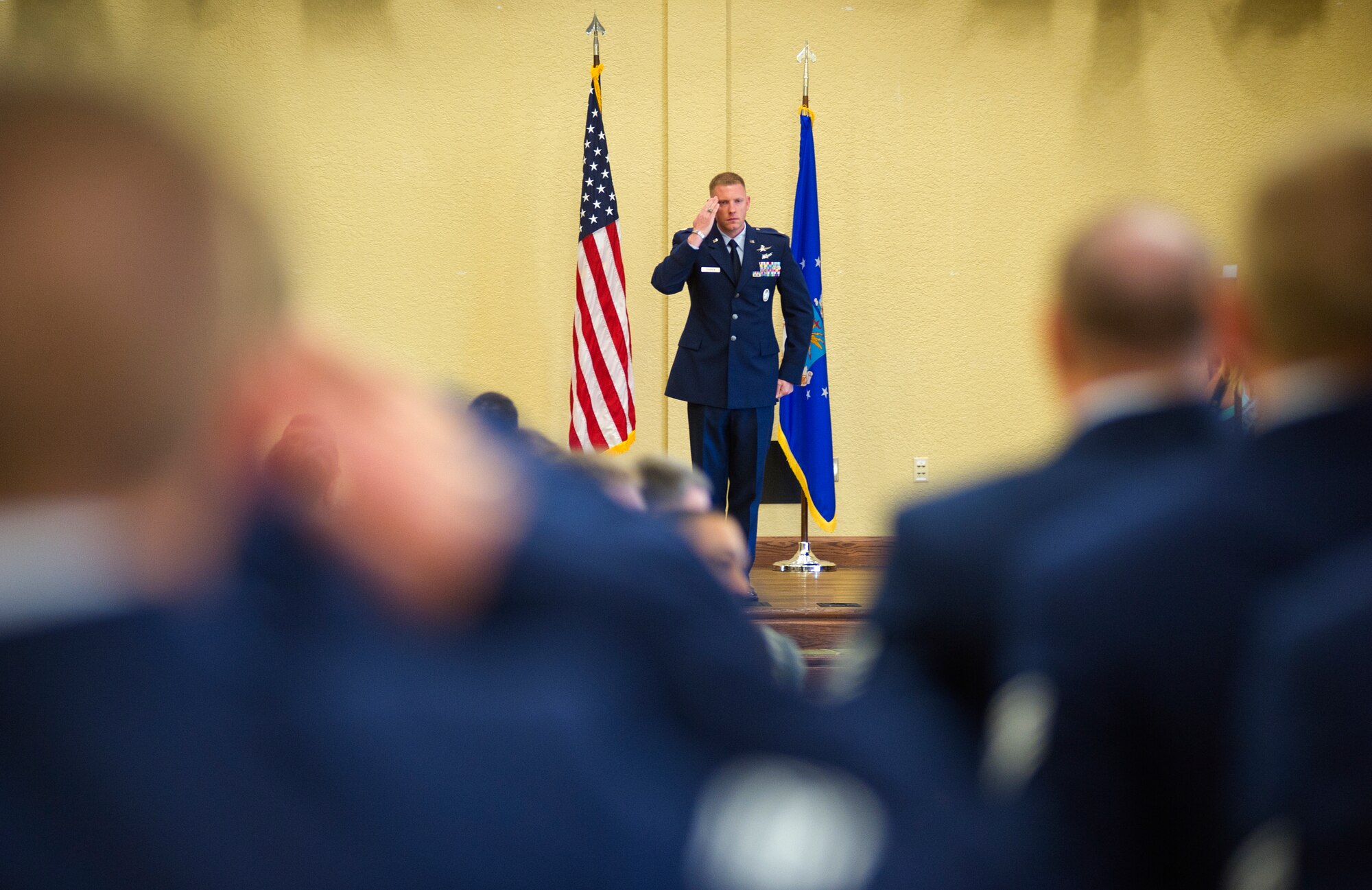 Maj. James Coughlin, incoming 85th Engineering Installation Squadron commander, returns a first salute from members of the 85th EIS during a change of command ceremony June 28, 2013, at the Bay Breeze Event Center, Keesler Air Force Base, Miss.  Col. Cynthia Wright, Cyberspace Engineering Installation Group commander, Tinker Air Force Base, Okla., was the presiding officer for the event and Lt. Col. Jeffrey Gomes was the outgoing 85th EIS commander.  (U.S. Air Force photo by Adam Bond)
