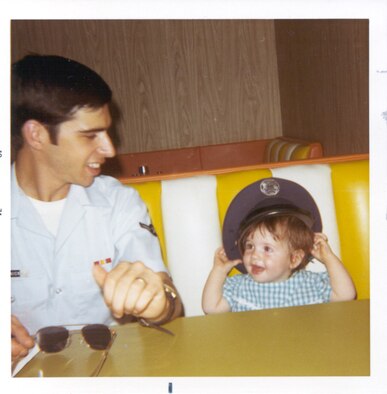 Airman Robert DeConnick with Kelly Sue circa 1971. DeConnick served as a Russian linguist before retiring at the rank of master sergeant. Kelly Sue writes "Avengers Assemble" and "Captain Marvel" for Marvel Comics. (Photo courtesy of Kelly Sue DeConnick)