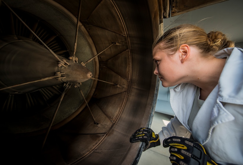 Staff Sgt. Jennifer Smith, 437th Maintenance Group jet-propulsion specialist, inspects the rear of a C-17 Globemaster III engine searching for cracks, bumps or other flaws during a routine maintenance check June 26, 2013, at Joint Base Charleston – Air Base, S.C. Airmen from the 437th MXG perform routine maintenance to C-17s daily. (U.S. Air Force photo/ Senior Airman Dennis Sloan)