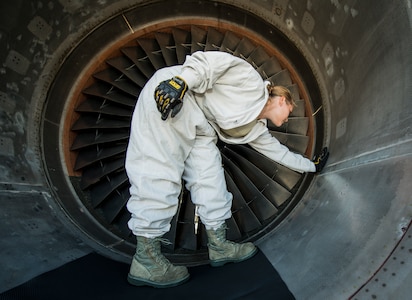 Staff Sgt. Jennifer Smith, 437th Maintenance Group jet-propulsion specialist, runs her hand along the inside of a C-17 Globemaster III engine inspecting for cracks, bumps or other flaws during a routine maintenance check June 26, 2013, at Joint Base Charleston – Air Base, S.C. Airmen from the 437th MXG perform routine maintenance to  C-17s daily. (U.S. Air Force photo/ Senior Airman Dennis Sloan)