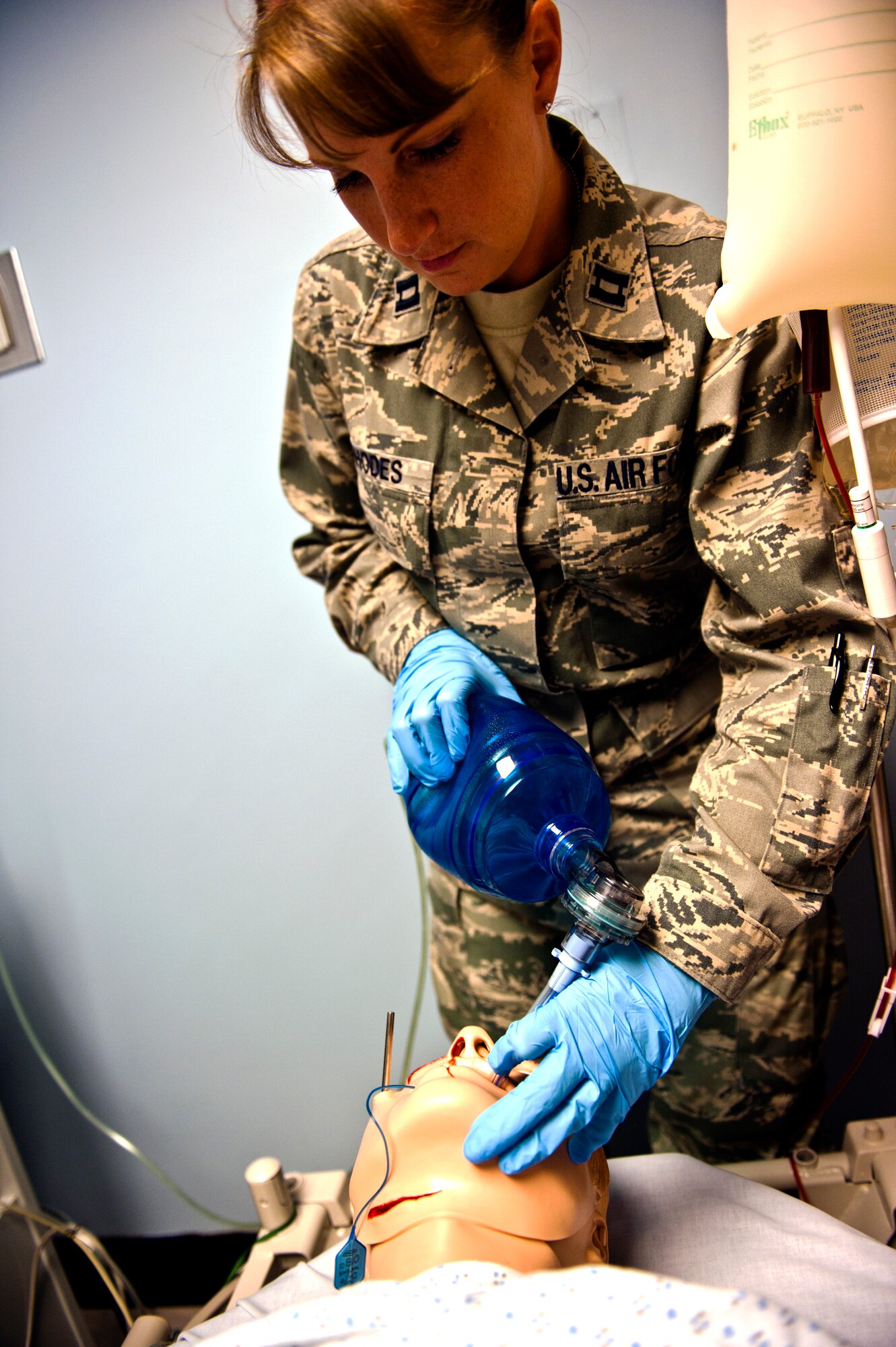 Capt. Rachel Rhodes, 39th Medical Operations Squadron clinical nurse, places a defibrillator into a Sim Man medical dummy during a training scenario June 19, 2013, at Incirlik Air Base, Turkey. The Sim Man can be used as a training tool for almost every kind of medical scenario. (U.S. Air Force photo by Senior Airman Daniel Phelps/Released)