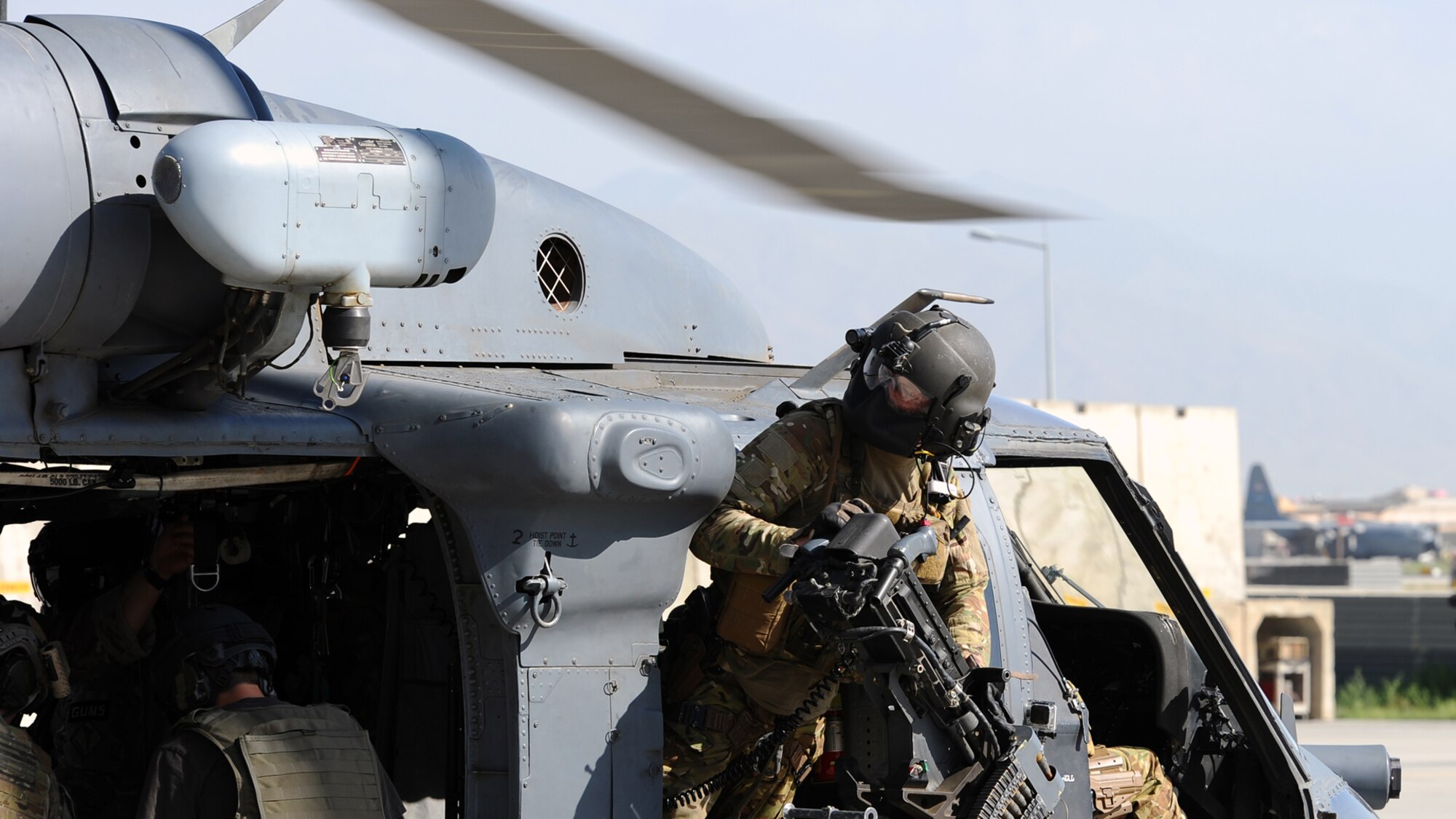 Airman 1st Class Sven Raemer, a special mission aviator with the 83rd Expeditionary Rescue Squadron, checks the rotary blades on his HH-60 Pave Hawk before a mission at Bagram Airfield June 17, 2013.  Raemer was born in West Berlin, Germany, before he and his family moved to Colorado in 1993. He is deployed from RAF Lakenheath, England. (U.S. Air Force photo/Tech. Sgt. Raymond Hoy)