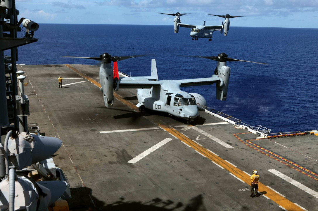 MV-22 Ospreys from Marine Medium Tiltrotor Squadron 265 (Reinforced), 31st Marine Expeditionary Unit, take off and land on the flight deck during deck landing qualifications here, June 28. This deployment marks the first time the 31st MEU has deployed with the Osprey, which recently replaced the CH-46E Sea Knight helicopter. The 31st MEU is the only continuously forward-deployed MEU and is the Marine Corps’ force in readiness in the Asia-Pacific region.