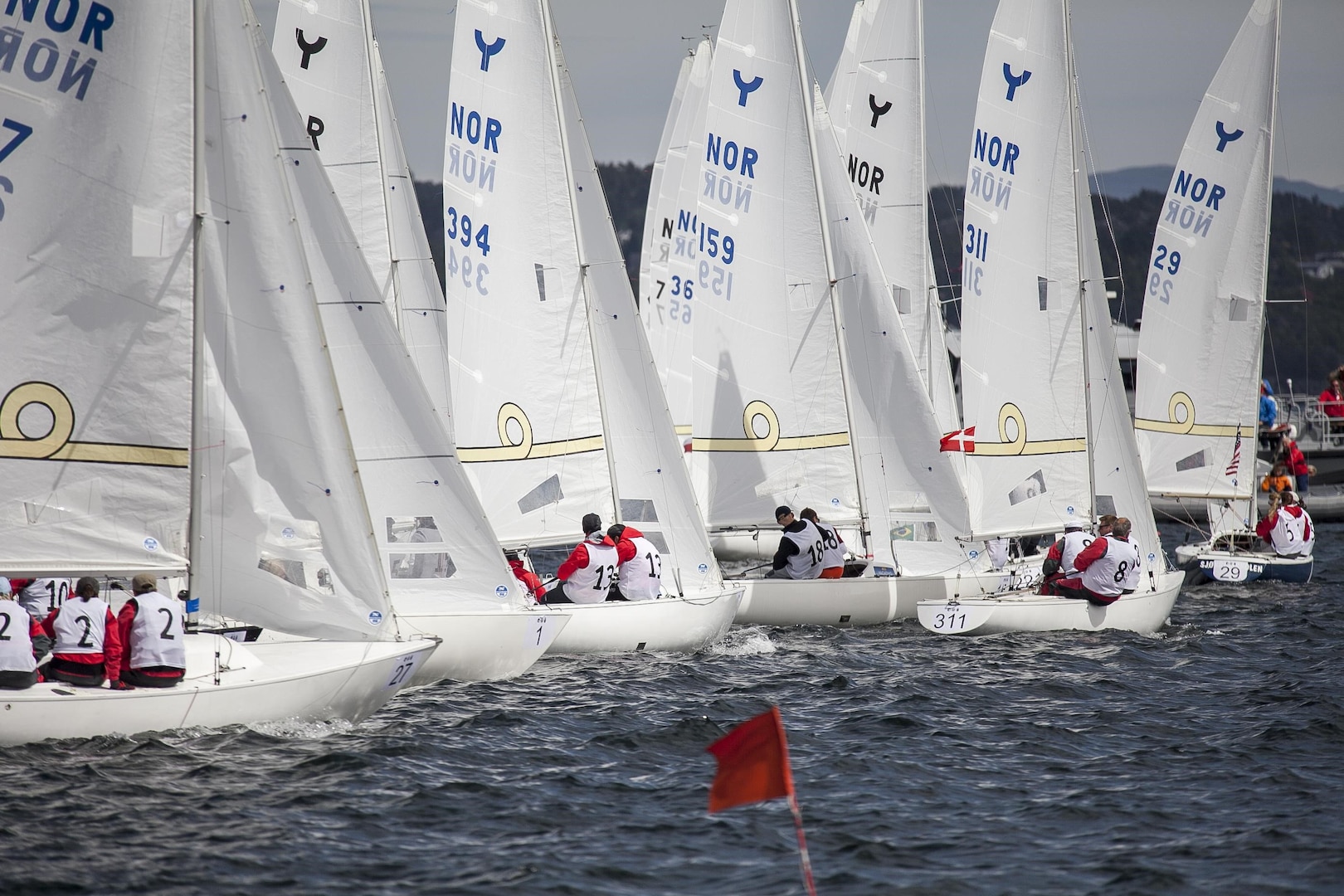 Teams line up for competition during day three of the 2013 CISM World Military Sailing Championship at the Askøy Yacht Club in Bergen, Norway