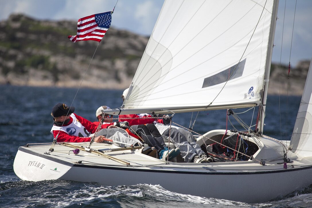 Team USA Men led by skipper ENS Taylor Vann round the corner during the 2013 CISM World Military Sailing Championship in Askoy, Bergen, Norway 27 June to 4 July.