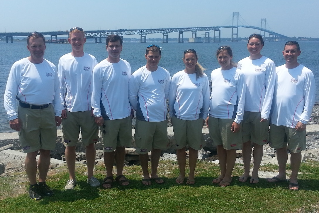 The 2013 US Armed Forces Men and Women Sailing Teams prepare for the 2013 CISM World Military Sailing Championship held in Bergen, Norway 27 June to 4 July.  Team USA prepared in Newport, RI under the leadership of Navy Captain Eric Irwin (Chief of Mission) and Navy Commander Dexter Hoag (Coach).  From left to right:  CAPT Eric Irwin, Navy; ENS Taylor Vann, Navy (Mens Skipper); LCDR Luke Suber, Navy (Mens Crew); LTJG Jonathan Duffet, Coast Guard (Mens Crew); LT Trisha Kutkiewicz, Navy (Womens Skipper); LTJG Krysta Tufts, Coast Guard (Womens Crew); LT Elizabeth Tufts, Coast Guard (Womens Crew); CDR Dexter Hoag, Navy.