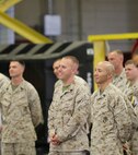 Marines with 2nd Maintenance Battalion, 2nd Marine Logistics Group smile during a lively speech given by 1st Lt. Patrick “Clebe” McClary July 2, 2013. In his speech McClary inspired service members to be do the best they can in life and to remember to smile. (U.S. Marine Corps photo by Lance Cpl. Shawn Valosin)