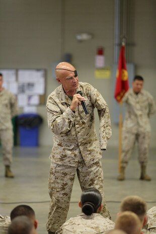 First Lt. Patrick “Clebe” McClary speaks to service members from 2nd Maintenance Battalion, 2nd Marine Logistics Group, July 2, 2013 aboard Camp Lejeune, N.C. McClary spoke to the battalion about the importance of communication, commitment and the value of life. (U.S. Marine Corps photo by Lance Cpl. Shawn Valosin)