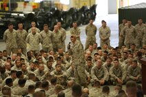 First Lt. Patrick “Clebe” McClary speaks to service members from 2nd Maintenance Battalion, 2nd Marine Logistics Group aboard Camp Lejeune, N.C., July 2, 2013. McClary talked to the service members on topics ranging from popular country songs to dedication to relationships and the Marine Corps. .  (U.S. Marine Corps photo by Lance Cpl. Shawn Valosin)