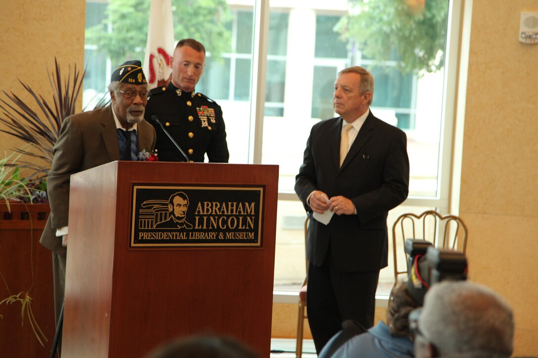 Cpl. Deloyce McMurray speaks during a Montford Point Marine ceremony in which he was presented the Congressional Gold Medal July 2 at the Abraham Lincoln Presidential Library. McMurray enlisted in the Marine Corps in 1944 and was one of the few African Americans sent to the segregated Montford Point, North Carolina for basic training. McMurray was deployed to the Pacific during World War II seeing action during the battle of Iwo Jima. (U.S. Marine Corps photo by Cpl. Erik S. Brooks Jr./ Released)