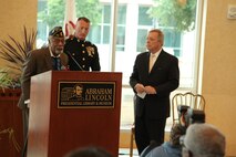 Cpl. Deloyce McMurray speaks during a Montford Point Marine ceremony in which he was presented the Congressional Gold Medal July 2 at the Abraham Lincoln Presidential Library. McMurray enlisted in the Marine Corps in 1944 and was one of the few African Americans sent to the segregated Montford Point, North Carolina for basic training. McMurray was deployed to the Pacific during World War II seeing action during the battle of Iwo Jima. (U.S. Marine Corps photo by Cpl. Erik S. Brooks Jr./ Released)
