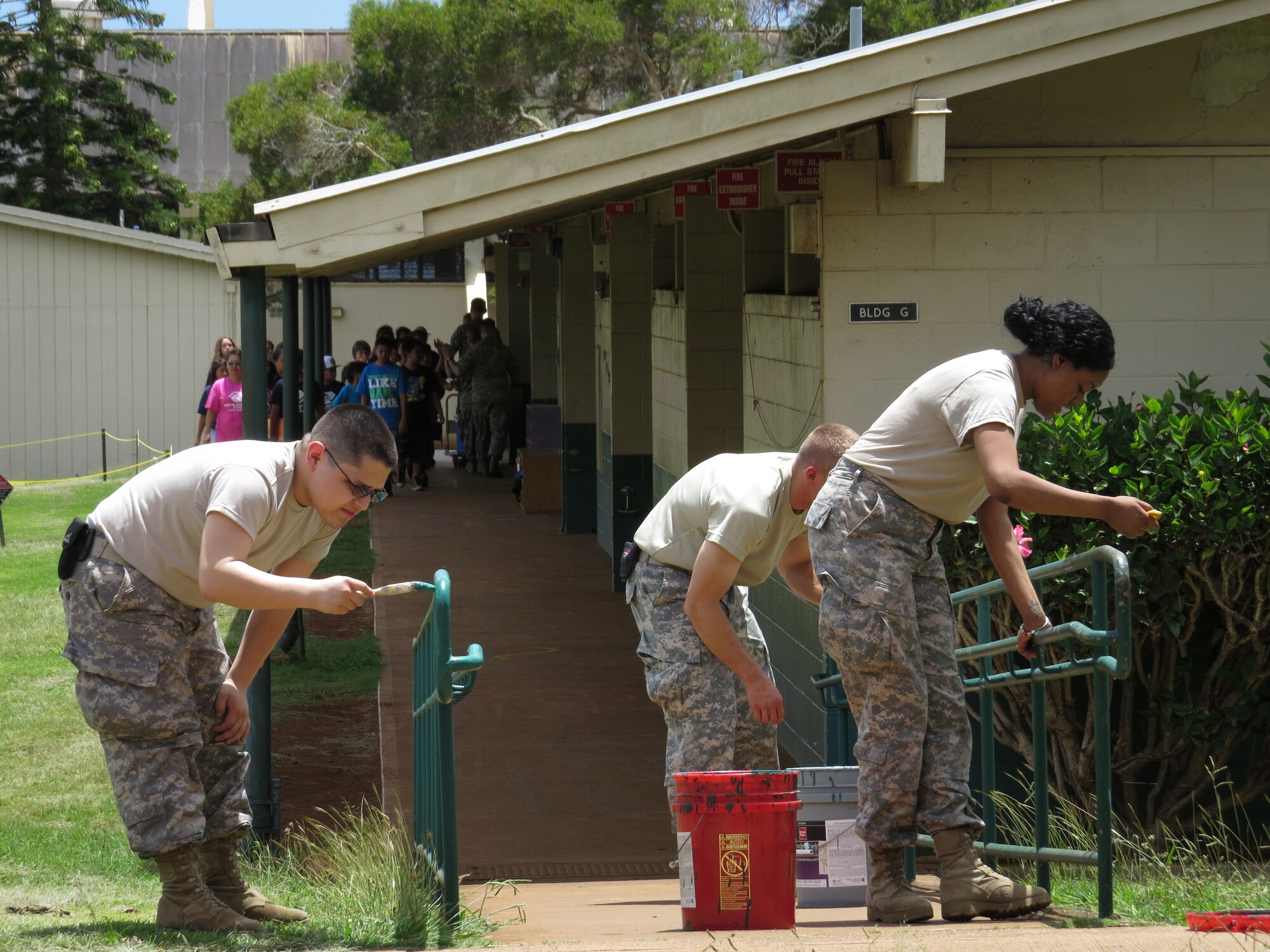 LANAI, Hawaii -- Military members assist in community projects here June 5, 2013, between medical training. Over 540 military personnel from multiple components of the Air Force, Army and Navy gathered on four Hawaiian Islands at six sites as part of a joint training mission called TROPIC CARE 2013 –  an Innovative Readiness Training project June 4 to 12, 2013, to care for medically-underserved Hawaiians. Photo by Ron Gingerich.