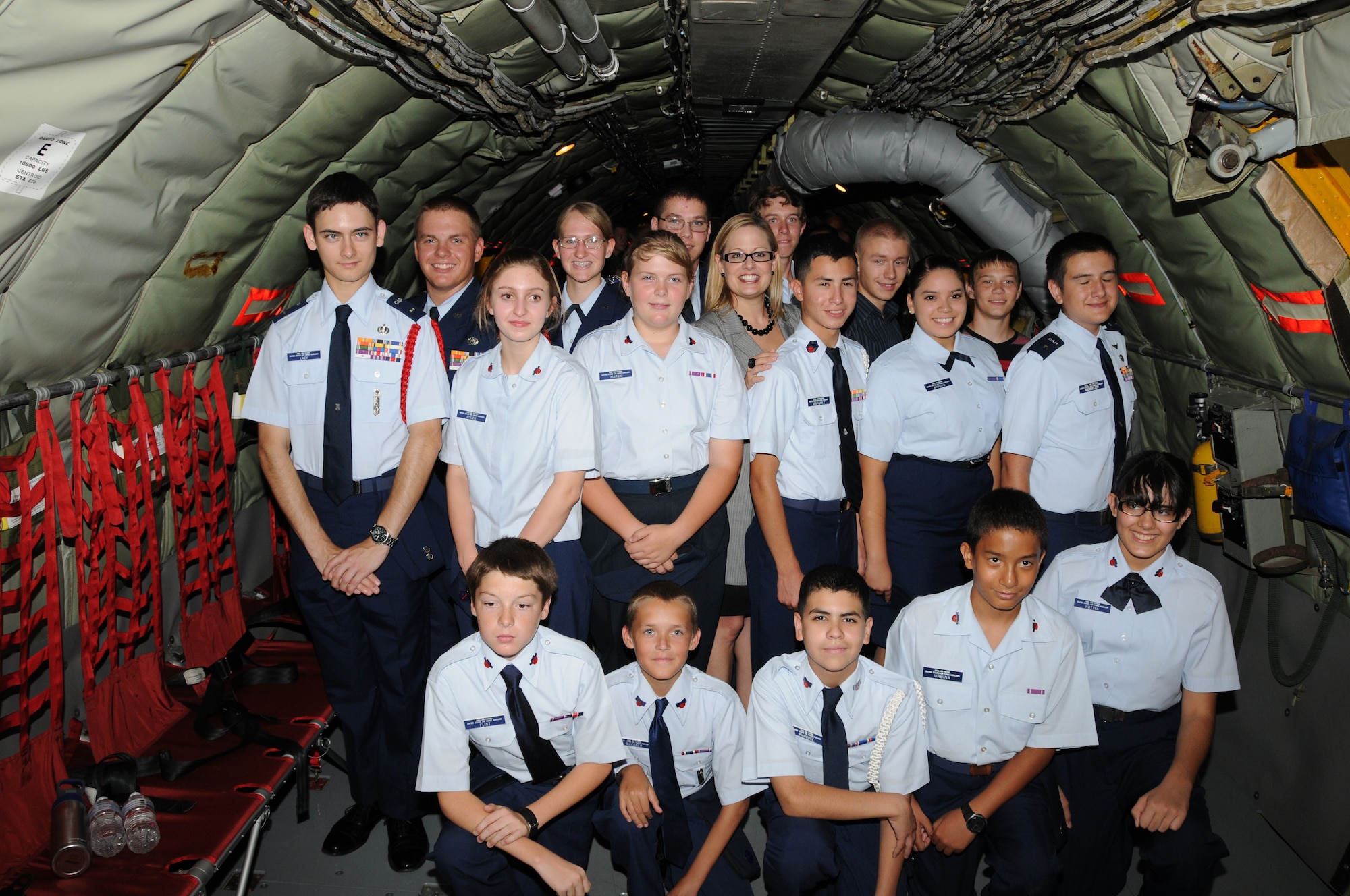 Cadets from the Sky Harbor Squadron 301, Arizona Wing Civil Air Patrol pose with Congresswoman Kyrsten Sinema inside a KC-135R Stratotanker at Phoenix Sky Harbor Air National Guard Base  July 1, 2013. Congresswoman Sinema was the guest speaker at the Civil Air Patrol July assembly held in the 161st Air Refueling Wing Dining Facility. (U.S. Air National Guard photo by Master Sgt. Kelly M. Deitloff/Released)