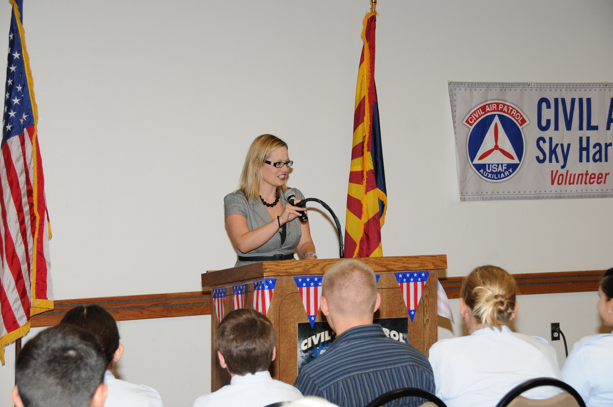 Congresswoman Kyrsten Sinema serving Arizona’s Ninth Congressional district, spoke to the Civil Air Patrol Sky Harbor Squadron 301 at the 161st Air Refueling Wing July 1, 2013. Sinema addressed the cadets about the importance of volunteering and the significance of their role in the Civil Air Patrol. (U.S. Air National Guard photo by Master Sgt. Kelly M. Deitloff/Released)