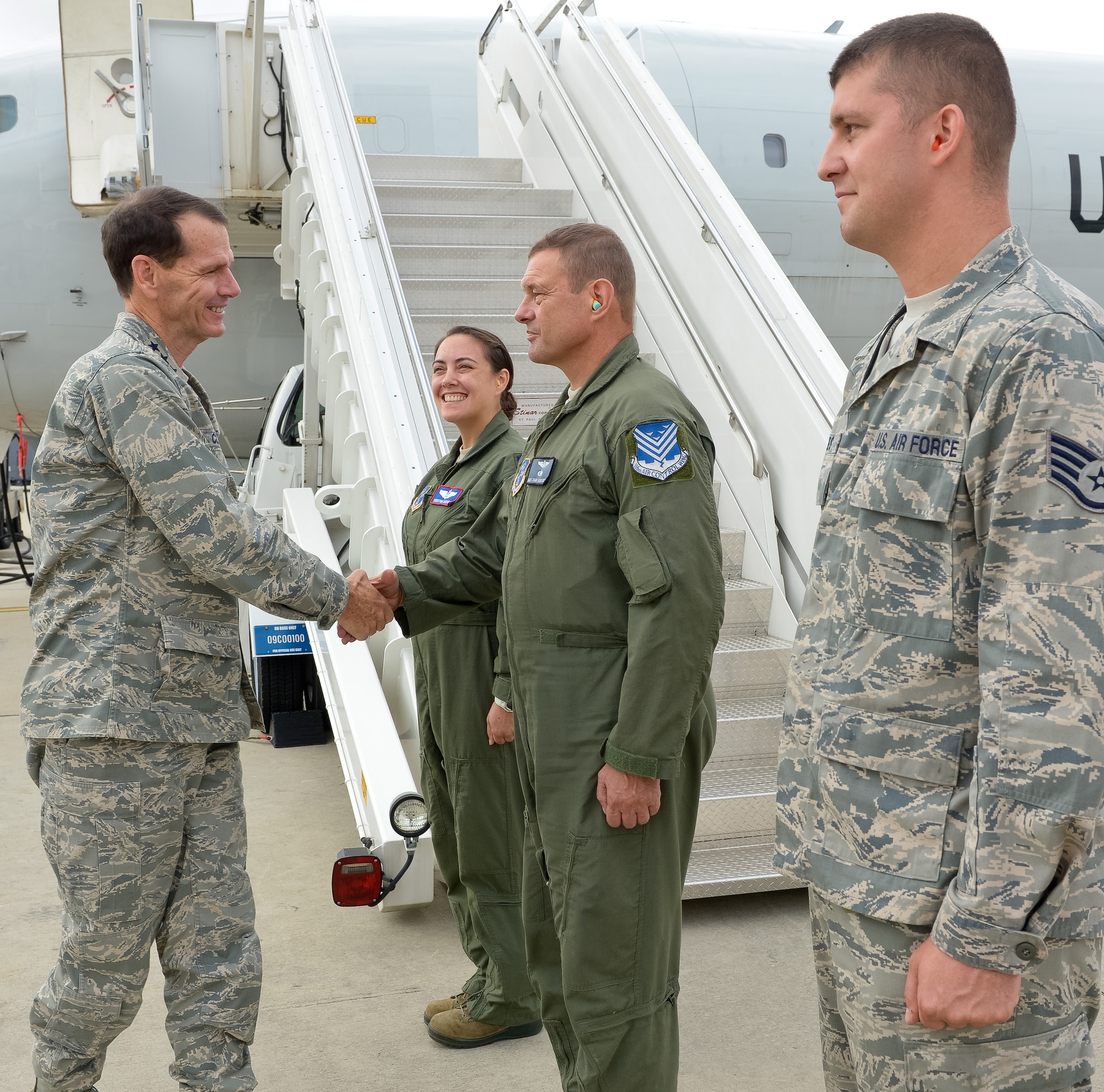 Lt. Gen. Stanley E. Clarke III, director of the Air National Guard, greets Airmen from Team JSTARS during an orientation visit to the 116th and 461st Air Control Wings at Robins Air Force Base, Ga., July 3, 2013.  The visit is Clarke's first to Team JSTARS since becoming director of the Air National Guard.  During the visit Clarke received a mission orientation, toured the E-8C and visited Airmen and Soldiers throughout the unit. (U.S. Air National Guard photo by Master Sgt. Roger Parsons/Released)