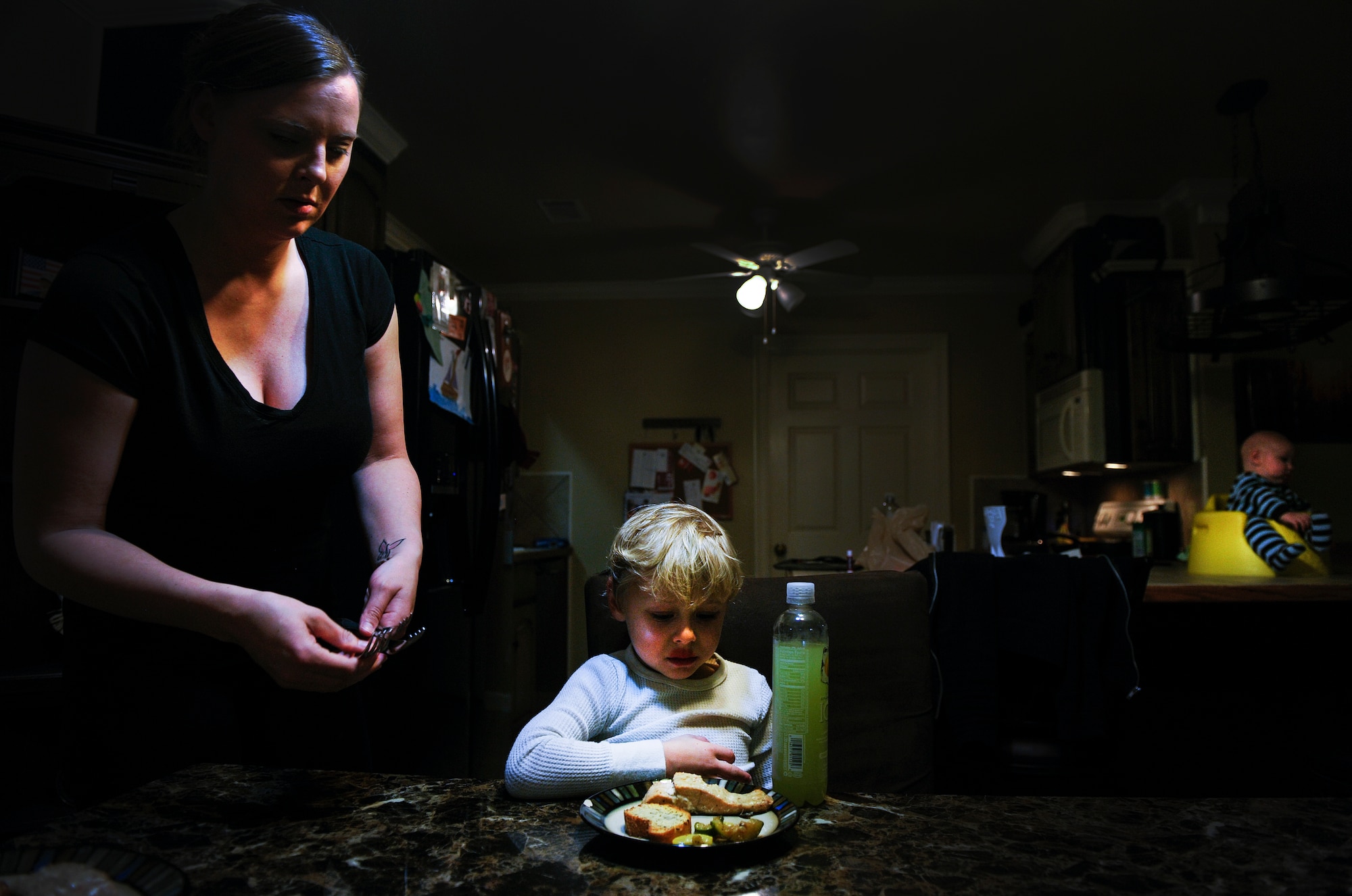 Ayden Drain protests his dinner Jan. 17, 2013 in Cabot, Ark. Even a small task like dinner has the potential to escalate into an argument when one parent is deployed.  (U.S. Air Force photo by Staff Sgt. Russ Scalf)