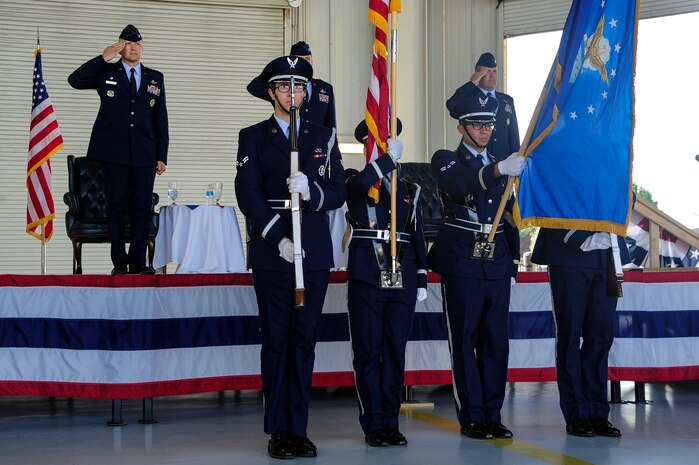 Members of the Joint Base Charleston - Air Base Honor Guard present the colors during the 437th Operations Group change of command ceremony June 27, 2013, in Nose Dock 2 at JB Charleston - Air Base, S.C. Boehm took command of the 437th OG from Col. Trevor Nitz. (U.S. Air Force photo/Staff Sgt. Rasheen Douglas)
