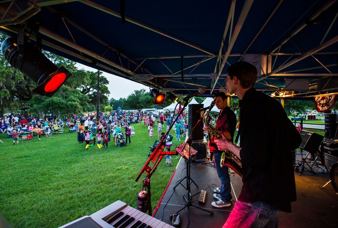 Members of the band Zero to Never perform June 28, during the 2013 Freedom Fest at Marrington Plantation at Joint Base Charleston – Weapons Station, S.C. Nearly 1,500 Airmen, Sailors, civilians and their families attended the celebration which included food, drinks, festival rides, music and fireworks. (U.S. Air Force photo/ Senior Airman George Goslin)