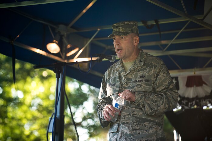 Col. Richard McComb, Joint Base Charleston commander, welcomes the crowd to the  2013 Freedom Fest June 28, at Marrington Plantation at Joint Base Charleston – Weapons Station, S.C. Nearly 1,500 Airmen, Sailors, civilians and their families attended the celebration which included food, drinks, festival rides, music and fireworks. (U.S. Air Force photo/ Senior Airman George Goslin)