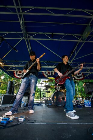 Members of the band Zero to Never perform June 28, during the 2013 Freedom Fest at Marrington Plantation at Joint Base Charleston – Weapons Station, S.C. Nearly 1,500 Airmen, Sailors, civilians and their families attended the fest which included food, drinks, festival rides, music and fireworks. (U.S. Air Force photo/ Senior Airman George Goslin)