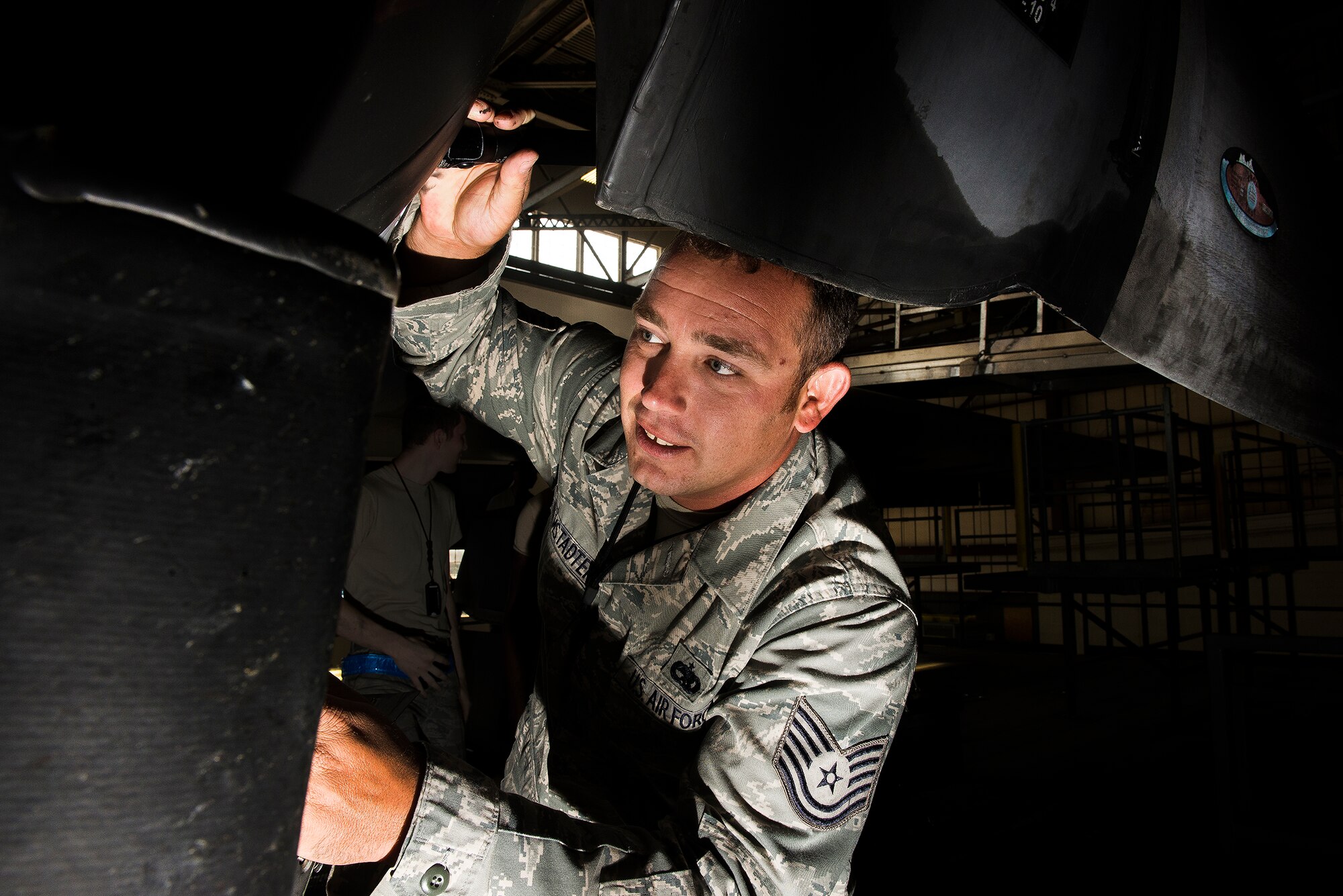 Tech. Sgt. Patrick Helmstadter, a 19th Maintenance Group quality assurance inspector, performs a quality verification inspection July 3, 2013, at Little Rock Air Force Base, Ark.  Helmstadter was inspecting maintenance actions on a C-130H that was receiving an isochronal inspection, which occurs every 540 days or after 1,200 flight hours. (U.S. Air Force photo by Staff Sgt. Russ Scalf)