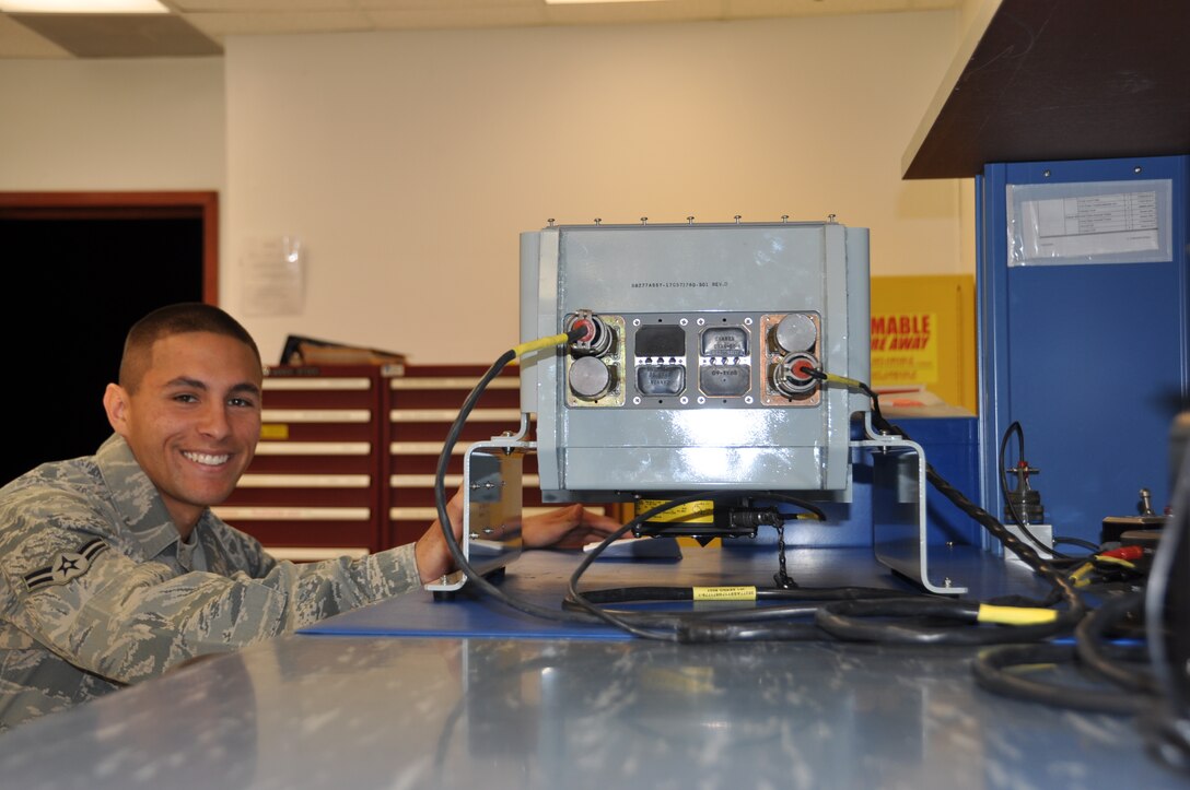 Airman 1st Class Scott Kraus, 60th Maintenance Squadron avionics flight, poses for a photo in the avionics shop June 30, 2013 at Travis Air Force Base, Calif. Krause is the Air Mobility Command recipient of the Tuskegee Airmen Inc.'s Senior Master Sgt. Margaret Barbour Frances Award for 2013. (U.S. Air Force photo/Nick DeCicco)
