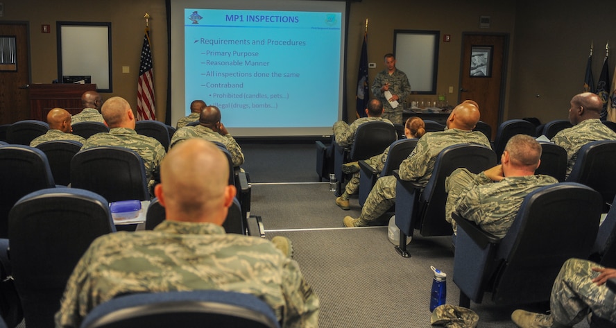 U.S. Air Force Master Sgt. Mark Diehl, 23d Comptroller Squadron and Wing Staff first sergeant, talks about dorm inspections and what a first sergeant can and cannot do at Moody Air Force Base, Ga., June 27, 2013. Diehl spoke about his experiences as a first sergeant and what he looks for during dorm inspections. (U.S. Air Force photo by Airman Alexis Grotz/Released)