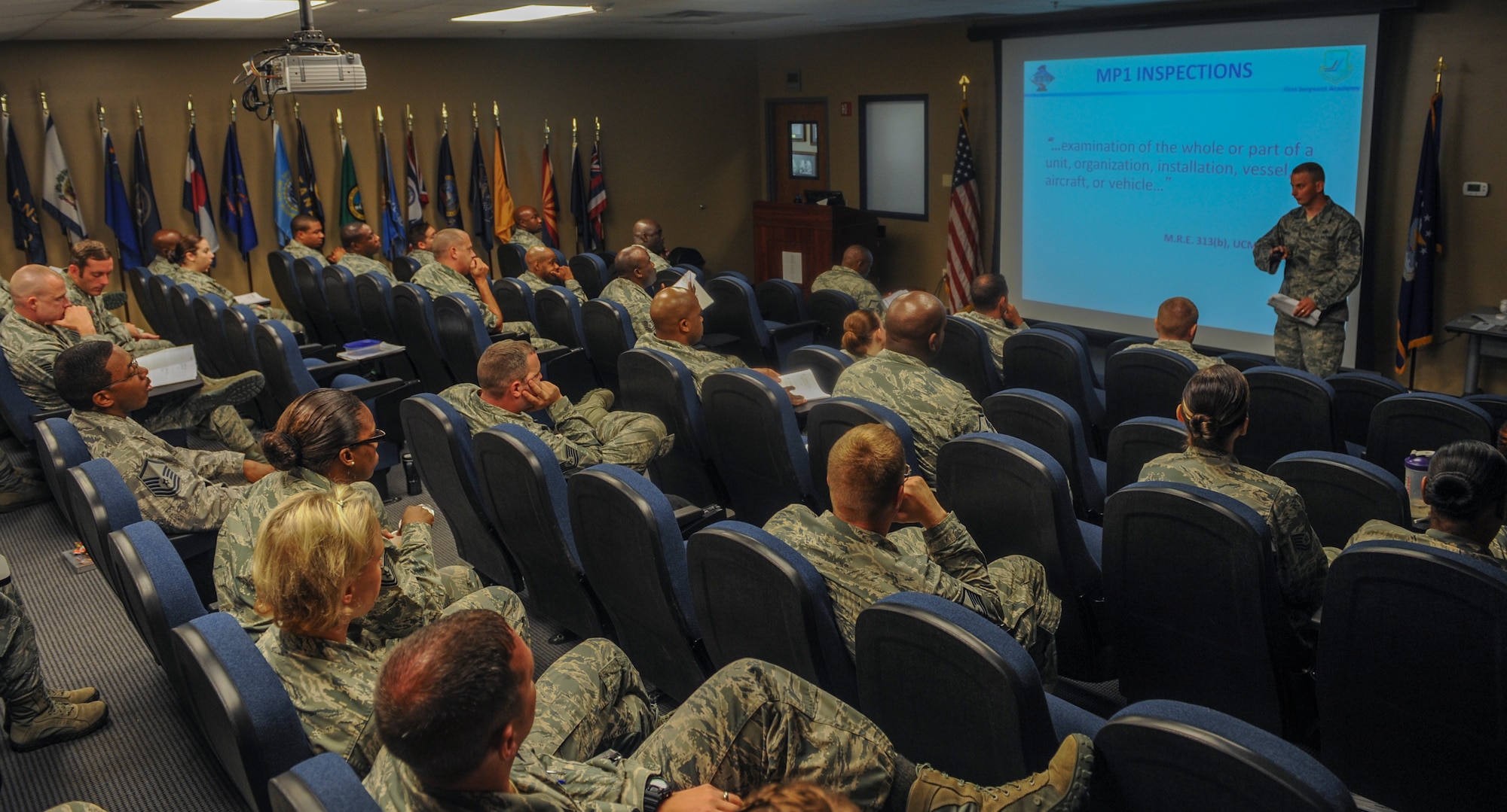 U.S. Air Force Master Sgt. Mark Diehl, 23d Comptroller Squadron and Wing Staff First Sergeant, lectures about duties of a first sergeant at Moody Air Force Base, Ga., June 27, 2013. Diehl was one of many people to speak to this group during the three-day long First Sergeants’ Symposium. (U.S. Air Force photo by Airman Alexis Grotz/Released)