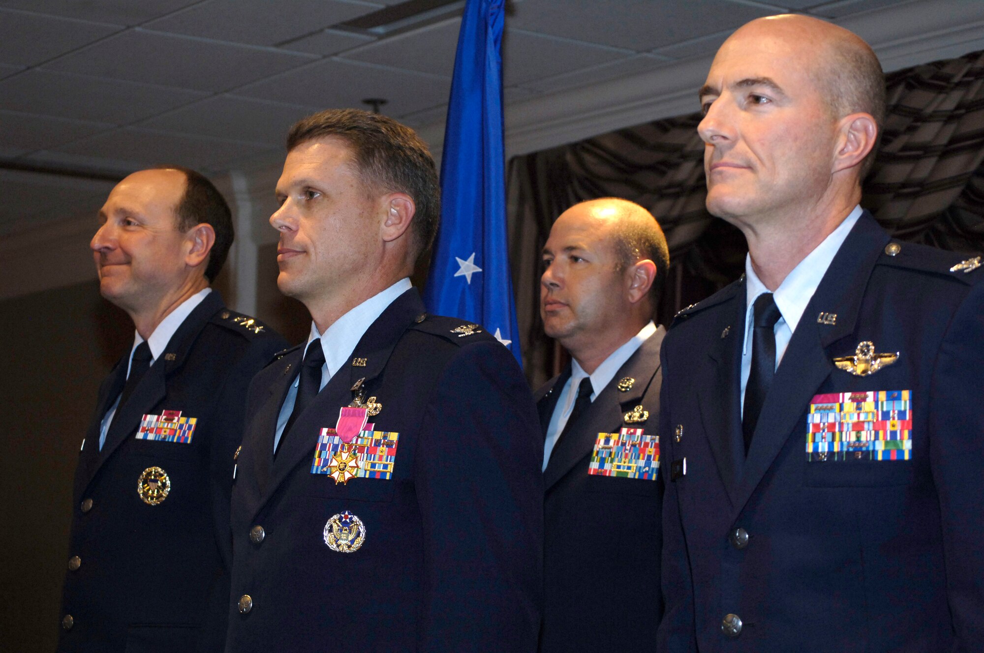 From left, Air Force Sustainment Center Commander Lt. Gen. Bruce Litchfield, Col. Steven Bleymaier, 72nd ABW Command Chief Master Sgt. Brian Lavoie and Col. Christopher Azzano. Colonel Azzano replaced Colonel Bleymaier as 72nd Air Base Wing commander during a change of command ceremony June 27. During the ceremony, Colonel Bleymaier received a Legion of Merit award, first oak leaf cluster. (Air Force photo by Darren D. Heusel)