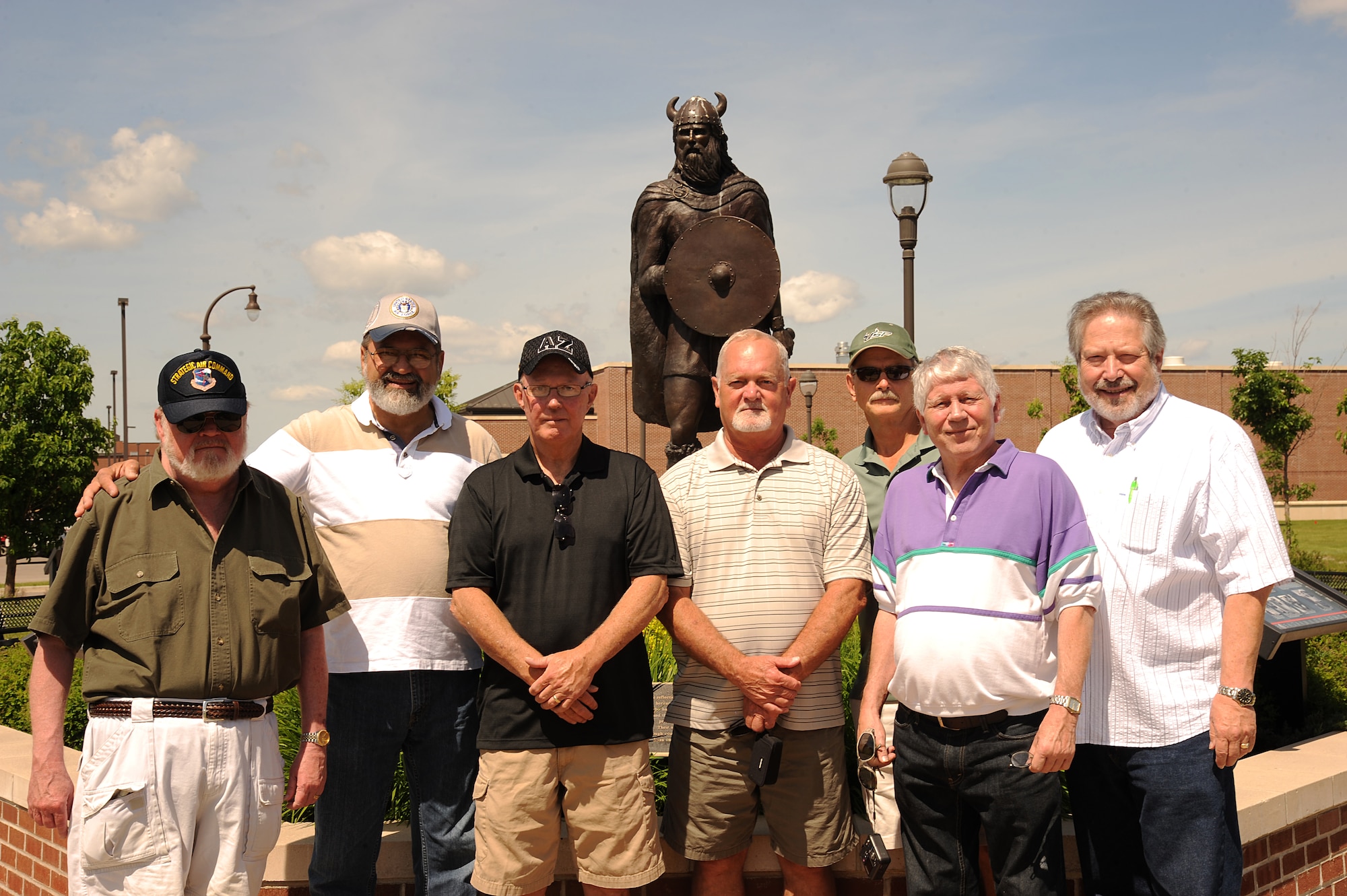 Former members of the 321st Missile Maintenance Squadron reunited for a photo during a tour of Grand Forks Air Force Base on June 19, 2013. (U.S. Air Force Photo/Airman 1st Class Xavier Navarro)