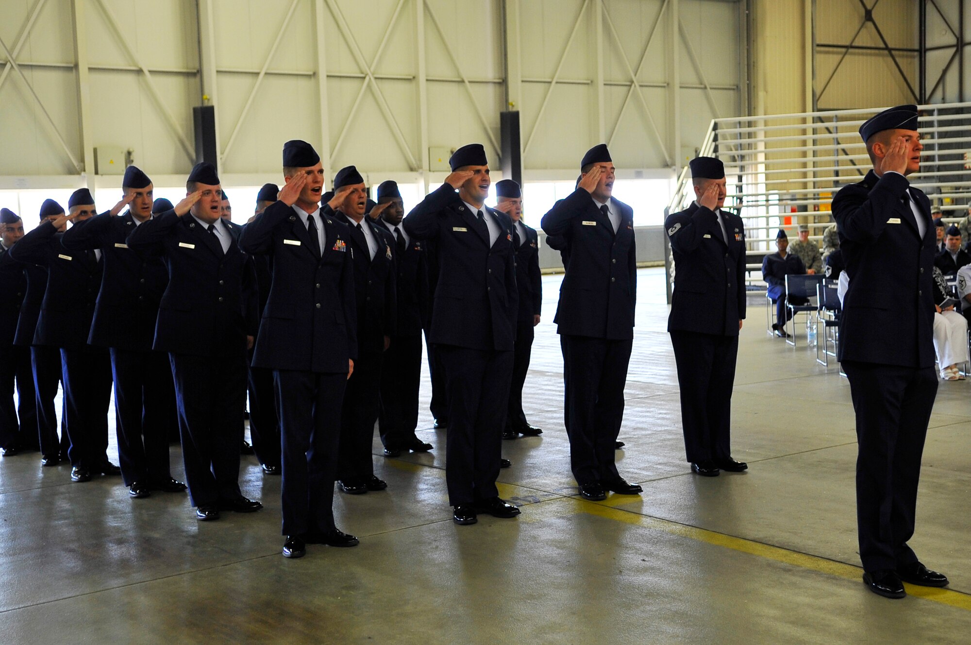 Members of the 86th Maintenance Operations Squadron salute their commander for the final time during the 86th MOS inactivation ceremony, July 1, 2013, Ramstein Air Base, Germany. The 86th MOS was inactivated and reorganized into the 86th Maintenance Group. (U.S. Air Force photo/Airman 1st Class Trevor Rhynes)