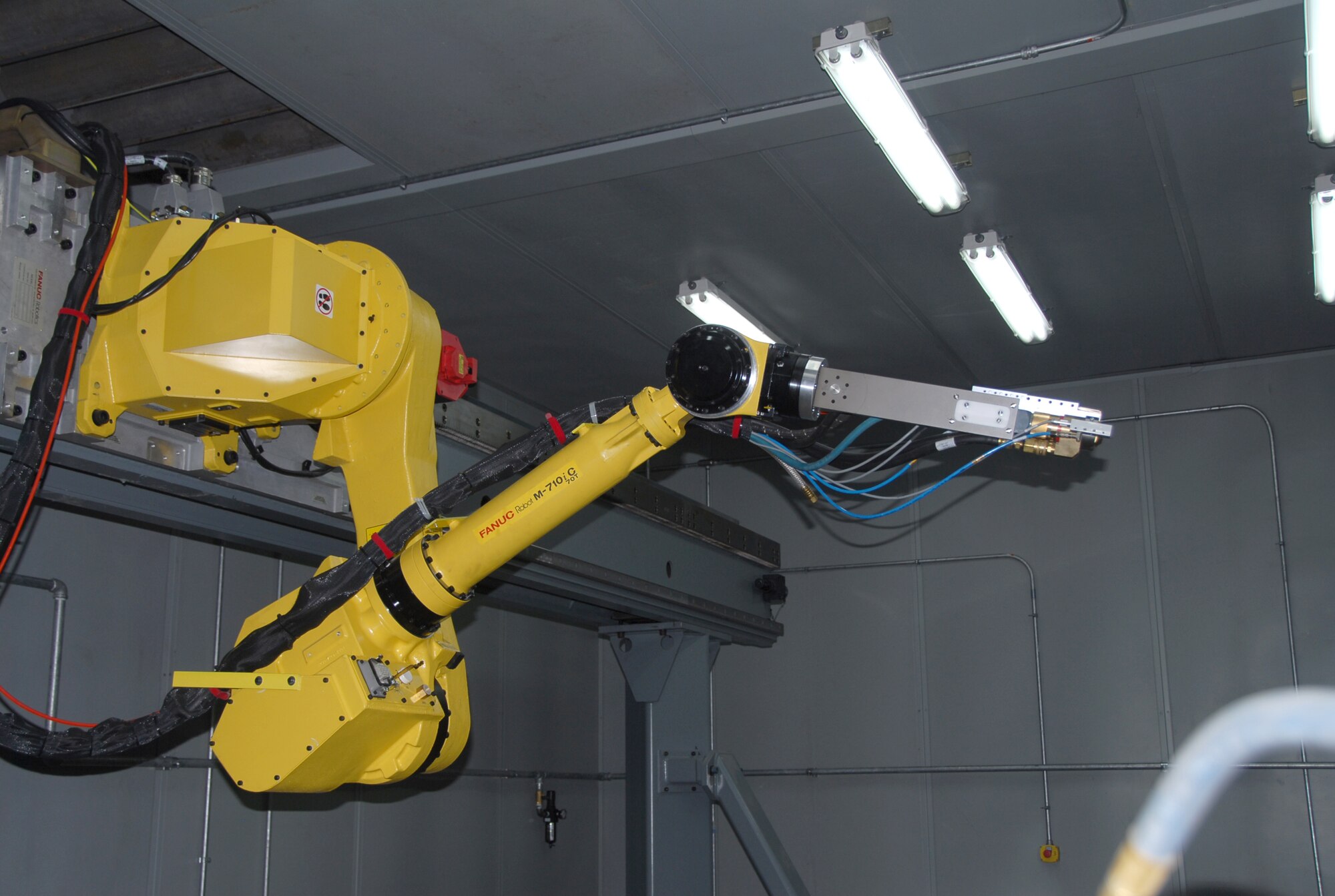 A new high velocity oxygen fuel spray system is scheduled to be operational in 2014. ( U. S. Air Force photo by Misuzu Allen/Released)