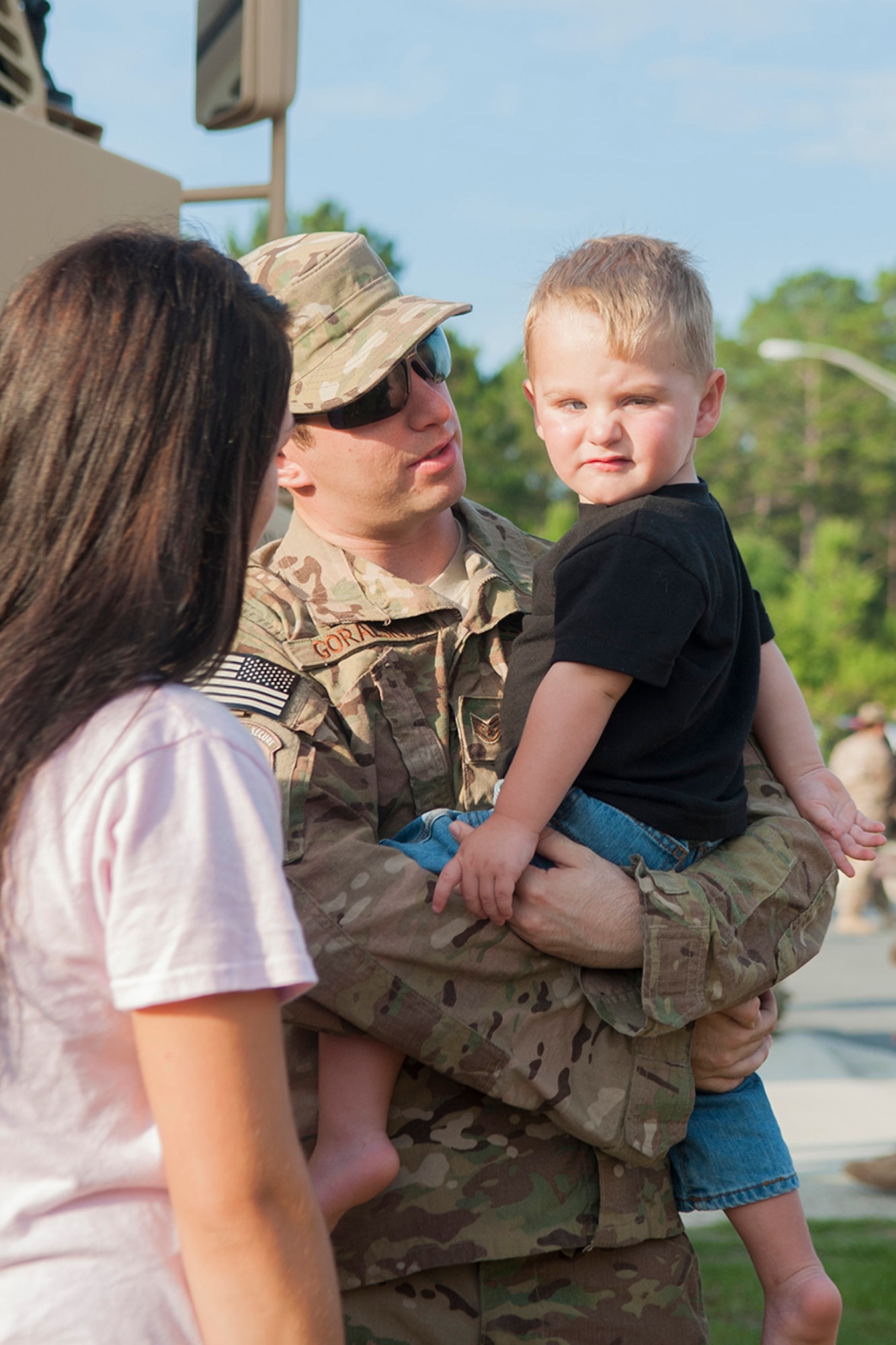 U.S. Air Force Staff Sgt. Marc Goralski, 823d Base Defense Squadron fireteam member, spends time with his family at Moody Air Force Base, Ga., June 28, 2013. Airmen were welcome to have family and friends visit the base before deploying. (U.S. Air Force photo by Airman 1st Class Sandra Marrero/released)