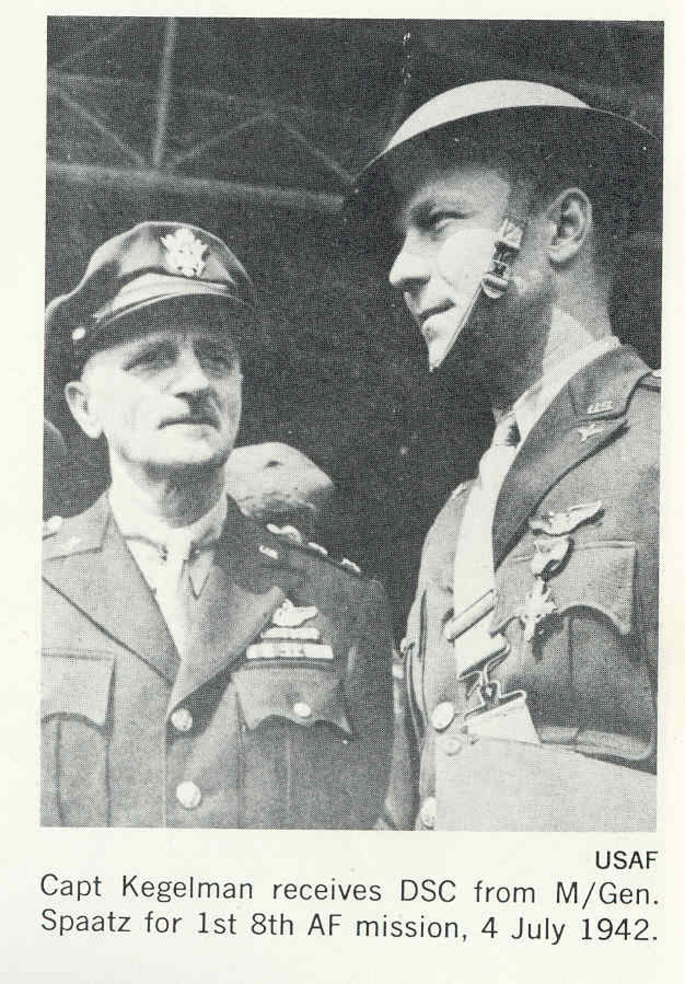 Capt. Charles Kegelman, 15th Bombardment Squadron commander, is awarded the Distinguished Service Cross for his flying performance during the Eighth Air Force July 4th bombing mission over Nazi-occupied Holland. (Courtesy photo)