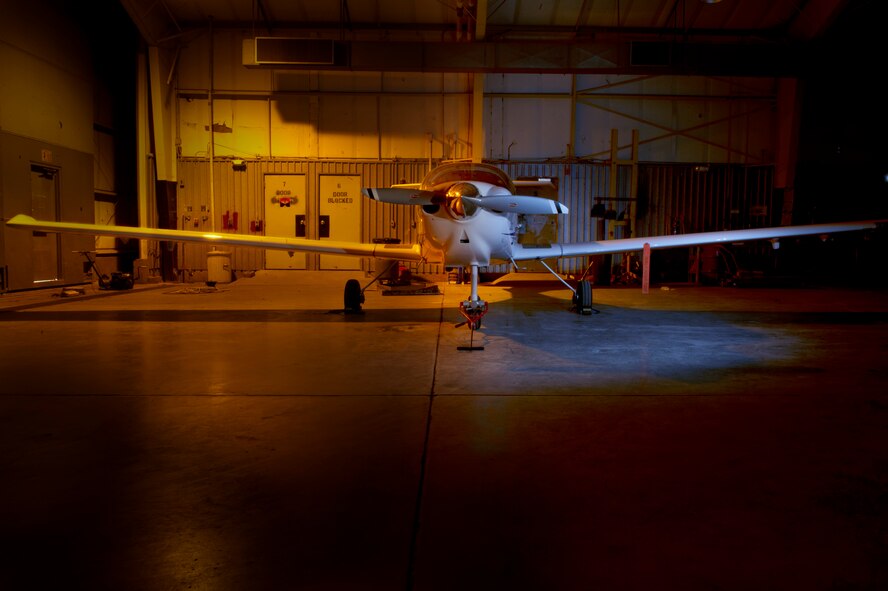 The DA40 Diamond Star is displayed at the Aero Club hangar at Holloman Air Force Base, N.M., June 24. The DA40 is the newest addition to the Holloman Aero Club. It is an Austrian four-seat, single engine, light aircraft ideal for training new pilots how to fly. The Aero Club is a federally approved flight school for both private and instrument ratings. The Aero Club follows both Federal Aviation Administration and Air Force rules, which has led to the best safety record in the general aviation industry. (U.S. Air Force photo illustration by Senior Airman Joshua Turner/Released) (This image was manipulated using multiple adjustment techniques)
