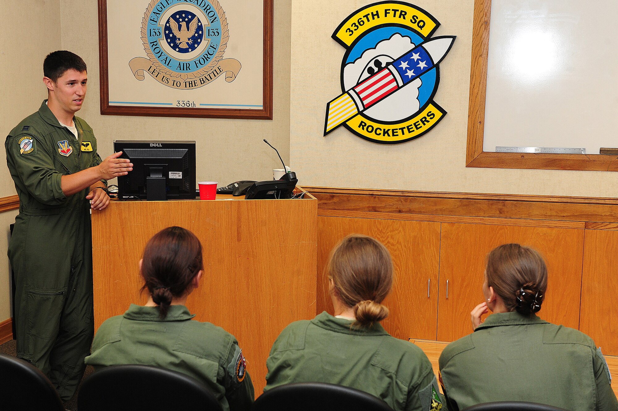 U.S. Air Force Capt. Michael Shea, 336th Fighter Squadron weapons system officer, briefs U.S. Air Force Academy cadets during their visit to Seymour Johnson Air Force Base, N.C., June 28, 2013.  Many of the cadets were interested in becoming pilots and were on base to get firsthand experience before making their career field decisions.  (U.S. Air Force photo by Airman 1st Class Brittain Crolley/Released)