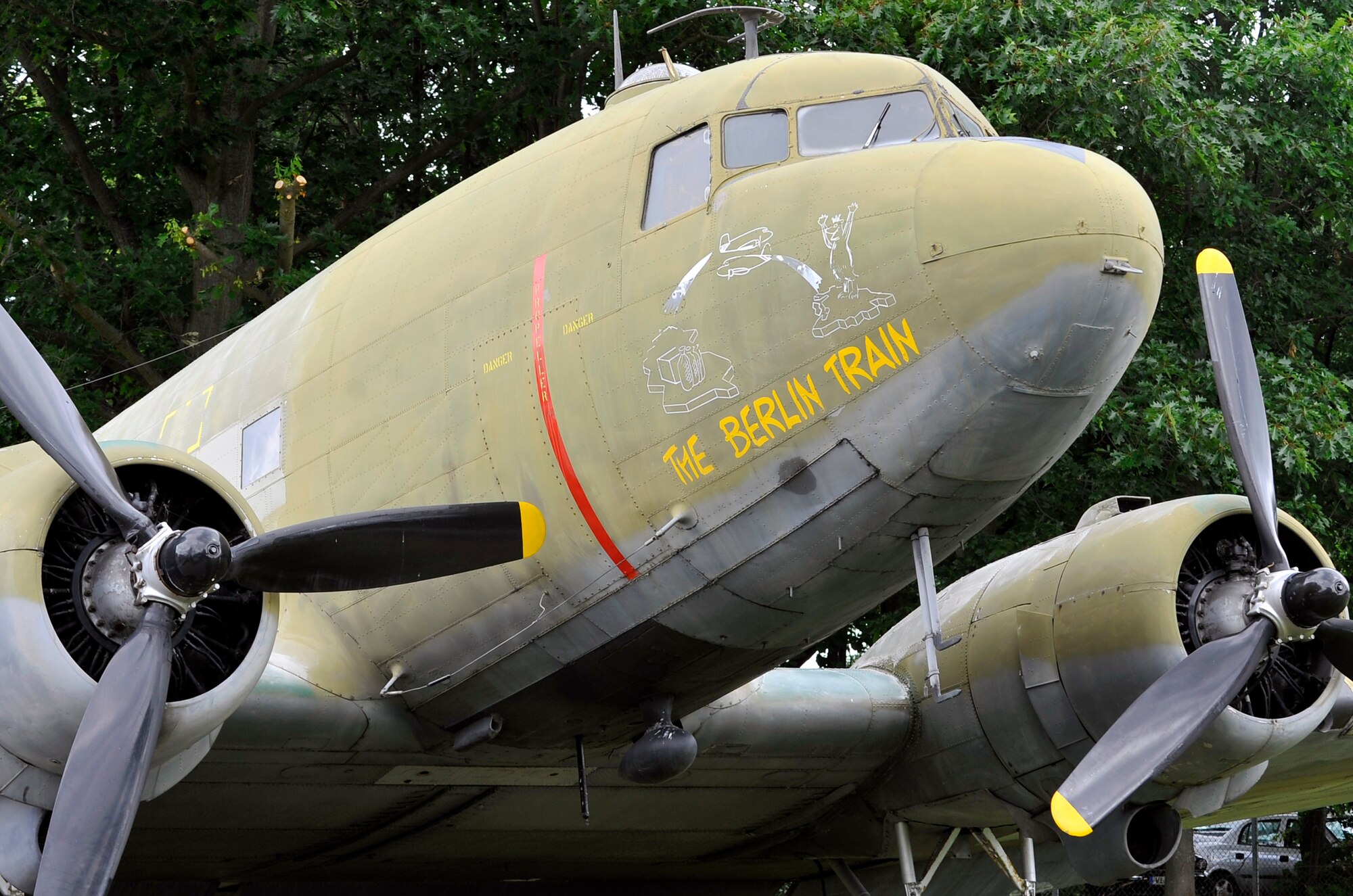 A C-47 sits at the Berlin Airlift memorial site where the 65th anniversary of the Berlin Airlift was celebrated, June 26, 2013, Frankfurt, Germany. The C-47 was one of two types of aircraft that participated in the Berlin Airlift; one of the biggest humanitarian missions in history. (U.S. Air Force photo/Airman 1st Class Trevor Rhynes)                                             
