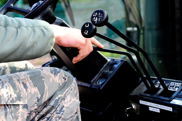 An Airman shifts the position of a forklift to hoist a pallet from a trailer during a safety stand-down day, June 28, 2013 at Ramstein Air Base, Germany. U.S. Air Forces in Europe and Air Forces Africa units participated in a safety stand-down day to emphasize the importance of MHE safety. (U.S. Air Force photo/Staff Sgt. Travis Edwards)