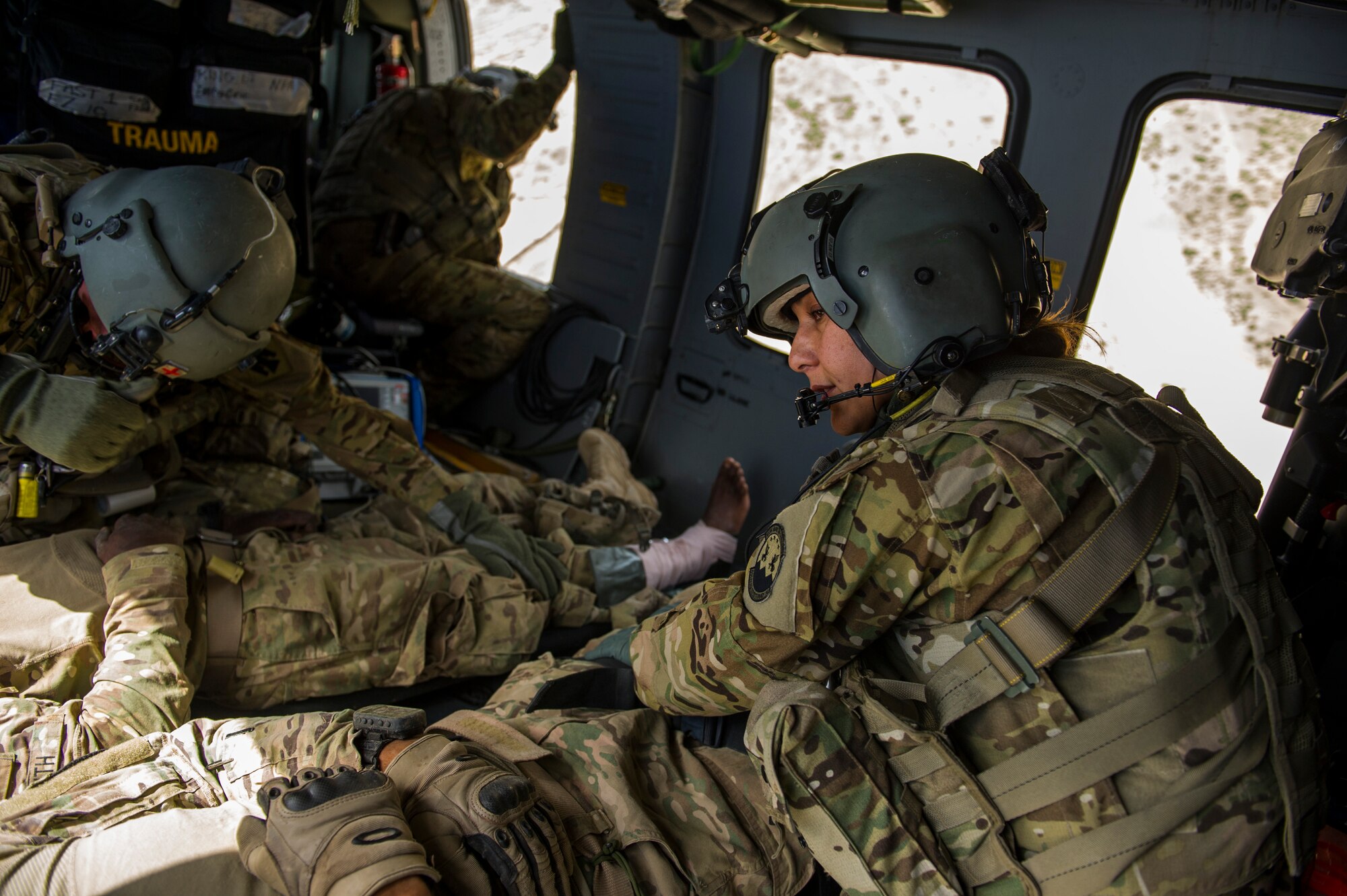 U.S. Air Force Maj. Sandra Nestor, tactical critical care evacuation team nurse, 3rd Platoon, C Company, 2-149 General Support Aviation Battalion Medical Evacuation, provides patient care en route to Forward Operating Base Orgun East, Eastern Afghanistan, May 15, 2013. MEDEVAC teams specialize in moving and treating U.S. and coalition forces who are injured and risk dying without immediate emergency care. (U.S. Air Force photo/Staff Sgt. Marleah Miller)