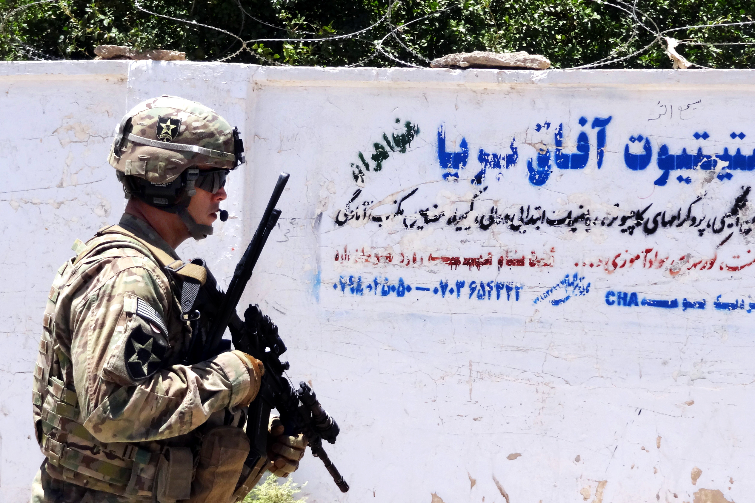 Army Capt. Juan Ortiz provides security 