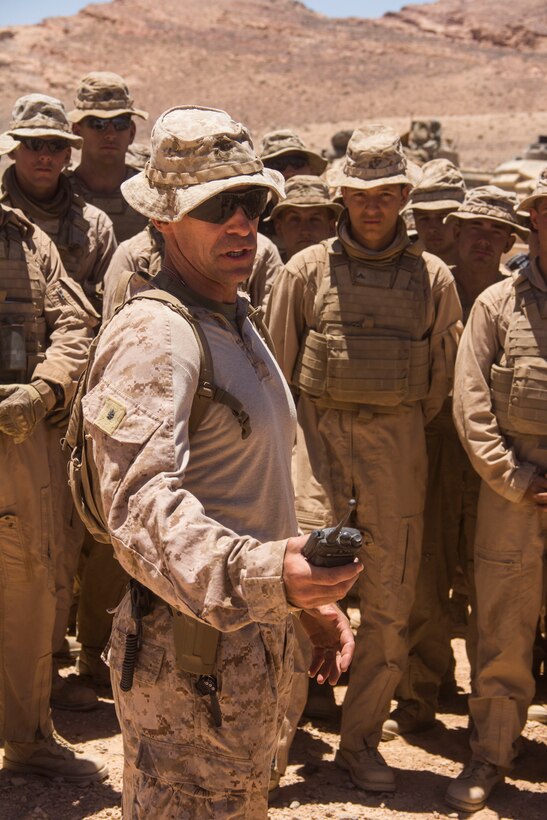 Lt. Col. Charles Cassidy, battalion commander of Battalion Landing Team 3/2, 26th Marine Expeditionary Unit (MEU), congratulates his Marines after their participation in the Combined Arms Live Fire Exercise, the culminating event of Exercise Eager Lion 2013 in Al Quweira, Jordan, June 19, 2013. Exercise Eager Lion 2013 is an annual, multinational exercise designed to strengthen military-to-military relationships and enhance security and stability in the region by responding to modern-day security scenarios.  The 26th MEU is deployed to the 5th Fleet area of responsibility as part of the Kearsarge Amphibious Ready Group. The 26th MEU operates continuously across the globe, providing the president and unified combatant commanders with a forward-deployed, sea-based quick reaction force. (U.S. Marine Corps photo by Cpl. Michael S. Lockett, 26th MEU Public Affairs)