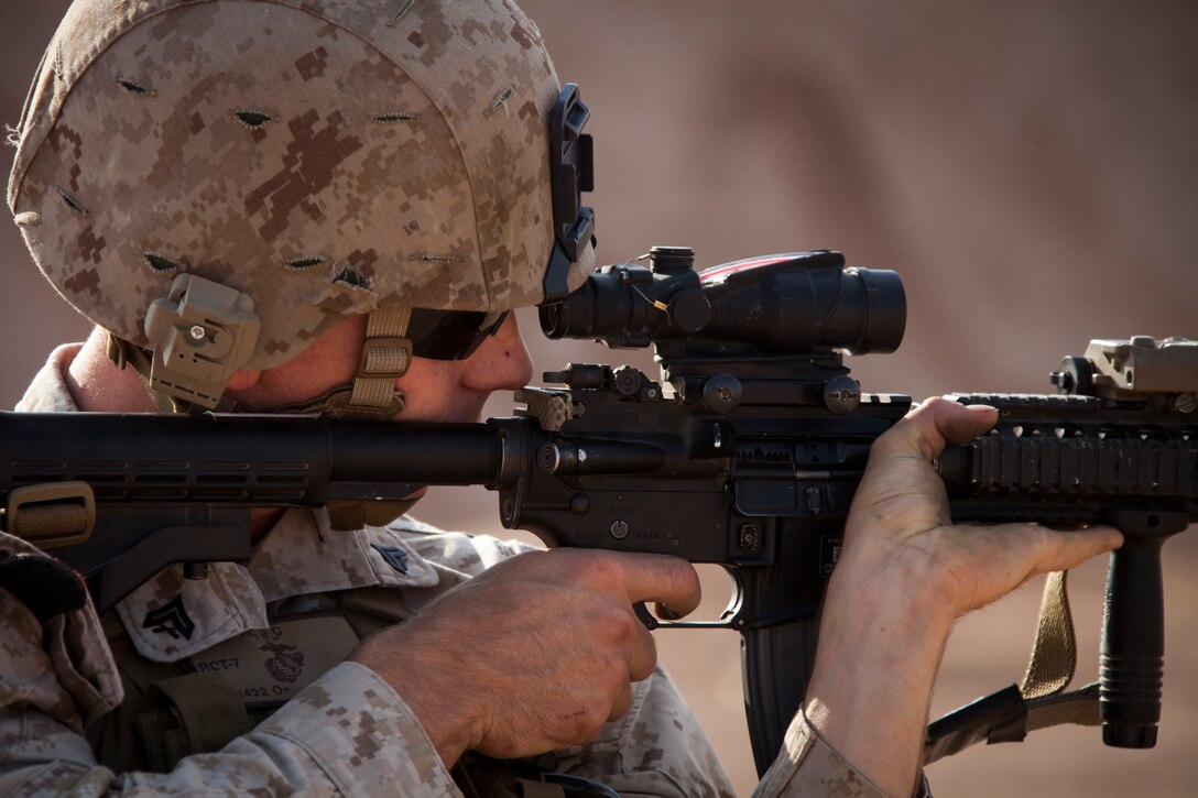 U.S. Marine Corps Cpl. Joseph Robinson from Buffalo N.Y. and assigned to Regimental Combat Team 7 engages his target during a foreign weapons and NATO ballistics live-fire shoot on Camp Leatherneck, Helmand province, Afghanistan, July 1, 2013. The Marines conducted the shoot to ensure serviceabilty of the weapons systems. (U.S. Marine Corps photo by Staff Sgt. Ezekiel R. Kitandwe/Released)
