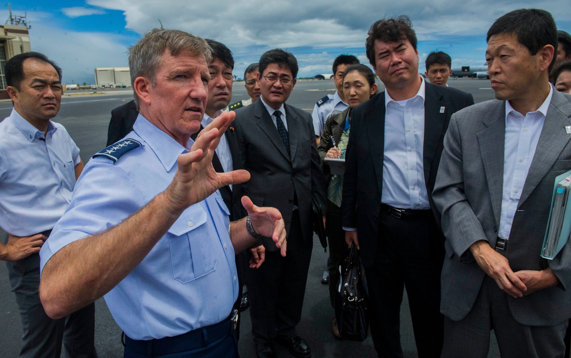 Gen. Hawk Carlisle, Pacific Air Forces commander, explains the capabilities of the KC-135 Stratotanker to a contingent of officials from the Japanese Ministry of Defense July 2 at Joint Base Pearl Harbor-Hickam, Hawaii. The KC-135, is a critical component in providing global reach and power projection capabilities to PACAF forces in support of U.S. Pacific Command. PACAF has a long-standing history and commitment to partnering with allies throughout the region, and the US-Japan alliance continues to be the cornerstone of peace and stability in the Pacific. (U.S. Air Force photo by Staff Sgt. Nathan Allen)