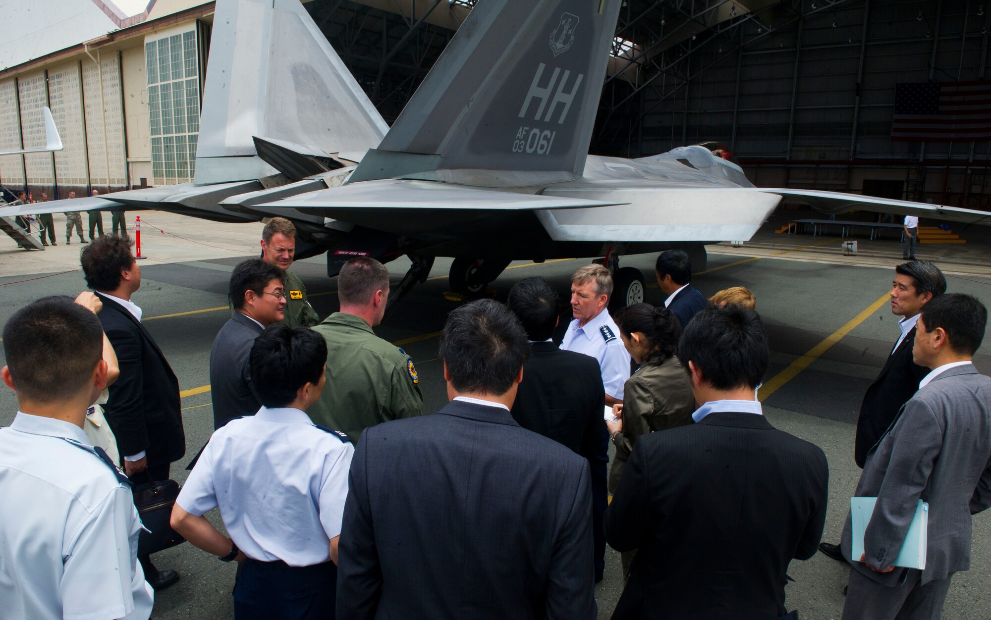 General Hawk Carlisle, Pacific Air Forces commander, briefs Japanese Minister of Defense Itsunori Onodera and a contingent of officials July 2 at Joint Base Pearl Harbor-Hickam, Hawaii. As part of the visit, the capabilities of the F-22 and fifth-generation aircraft were highlighted.  Japan's own planned purchase of the F-35 will further increase capabilities of the Japan Air Self-Defense Force and increase the already strong interoperability between theJASDF and U.S. Air Force in Defense of Japan and the region. (U.S. Air Force photo by Staff Sgt. Nathan Allen)