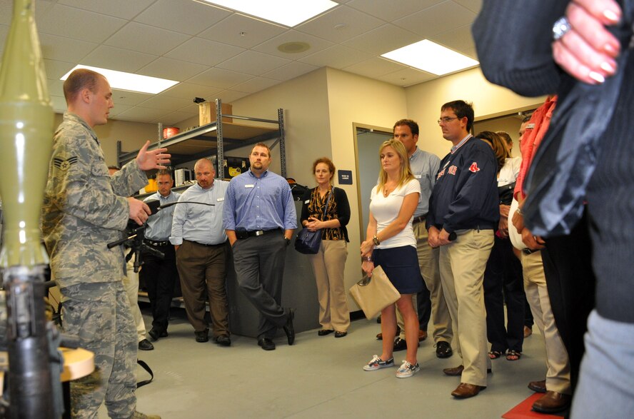 MACDILL AIR FORCE BASE, Fla. – Senior Airman Sam Reardon, an explosive ordnance journeyman with the 6th Civil Engineering Squadron, describes how Explosive Ordinance Disposal disarms and disposes of unexploded ordnance. (U.S. Air Force photo/Maj. Christine Stanaback)