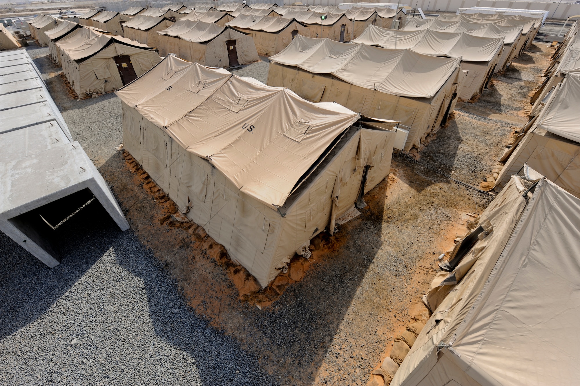 A view of a tent city used by the 380th Air Expeditionary Wing at an undisclosed location in Southwest Asia July 2, 2013. The 380th Expeditionary Civil Engineer Squadron’s Structures Shop maintains all tents and hardened facilities on the installation. (U.S. Air Force photo by Staff Sgt. Joshua J. Garcia)