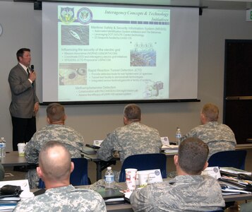 Bob Reininger, North American Aerospace Defense Command and U.S. Northern Command Interagency Coordination office, speaks to more than 50 National Guard officers during the Joint Task Force Commander Training Course June 14. the course is designed to prepare potential joint task force commanders to coordinate active-duty, National Guard and federal civilian agencies during a crisis. 

