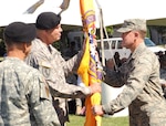 Army Lt. Gen. Guy Swan III, commanding general of U.S. Army North and Fort Sam Houston, passes the Joint Task Force – Civil Support colors to Air Force Brig. Gen. Jonathan Treacy, the unit’s new commander, during a change of command ceremony at Fort Monroe's Continental Park July 2. 

