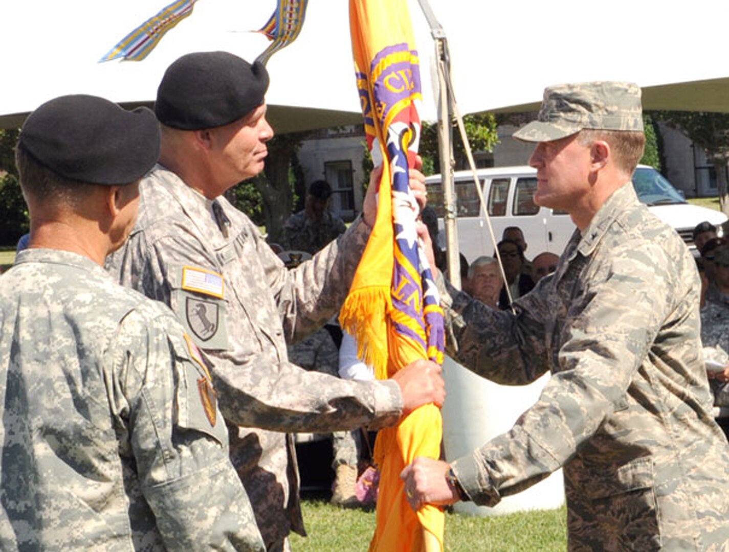 Army Lt. Gen. Guy Swan III, commanding general of U.S. Army North and Fort Sam Houston, passes the Joint Task Force – Civil Support colors to Air Force Brig. Gen. Jonathan Treacy, the unit’s new commander, during a change of command ceremony at Fort Monroe's Continental Park July 2. 

